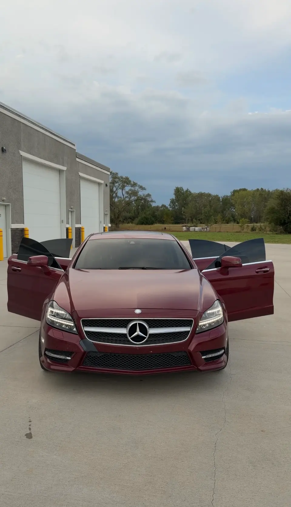 Burgundy Mercedes with a freshly finished vinyl wrap